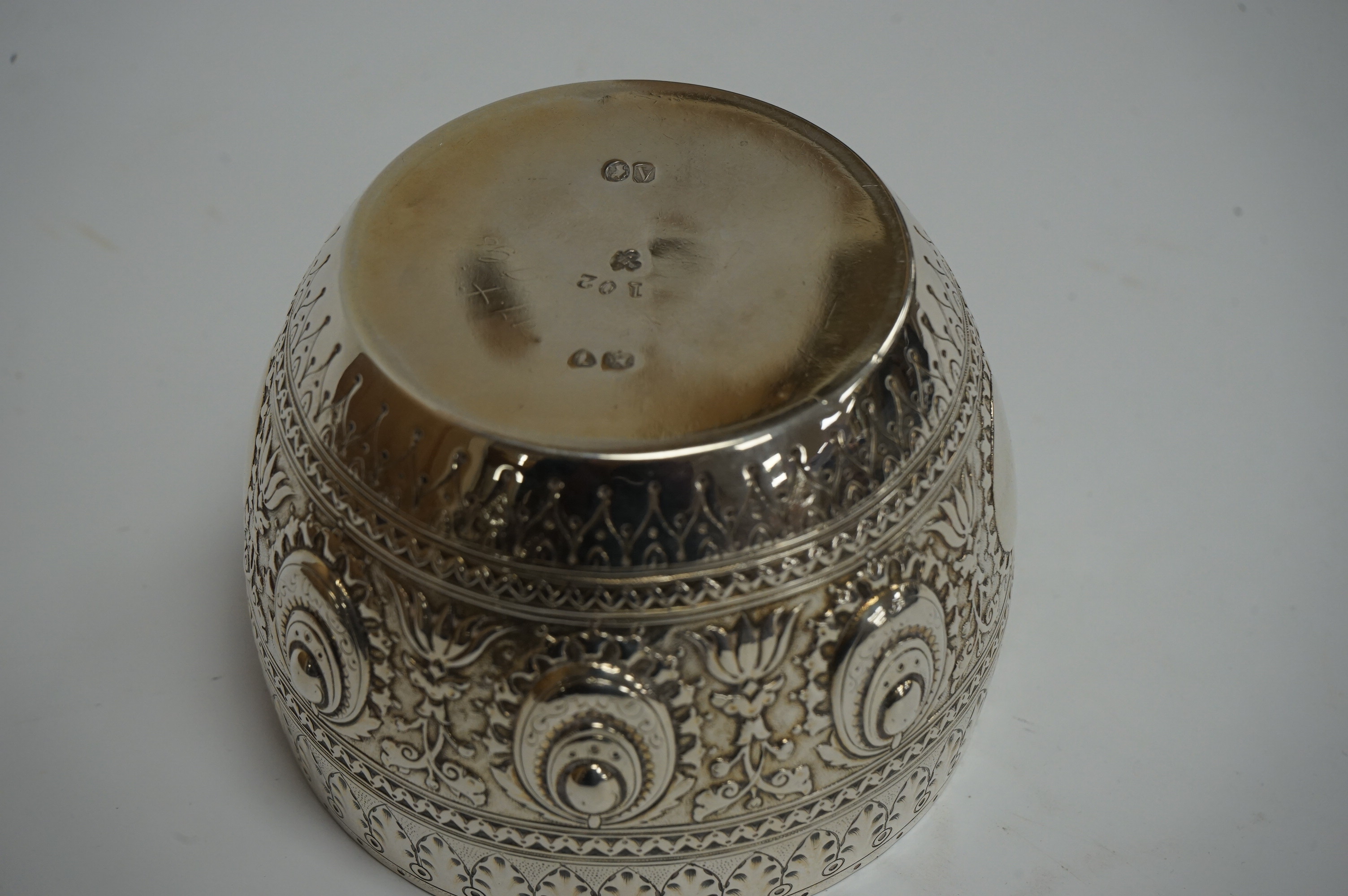 A Victorian embossed silver sugar bowl, by The Barnards, London, 1876, diameter 94mm, 4.4oz. Condition - good